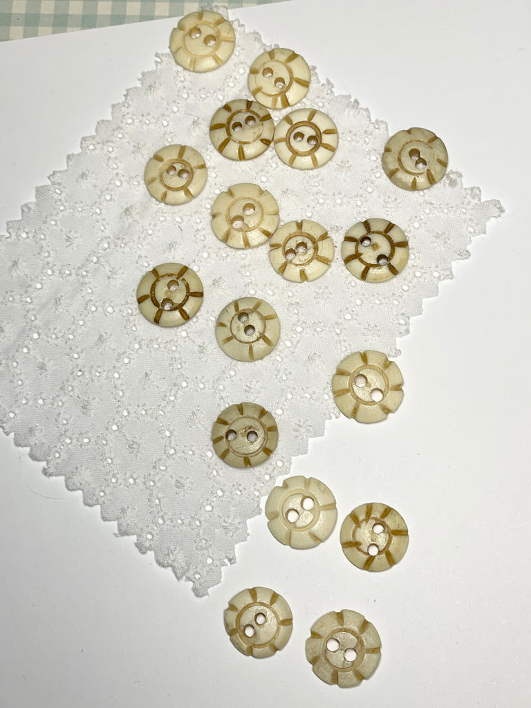 These quirky buttons are carved from bone in India, they are extremely unusual, the holes are all placed differently showing that these are indeed a "village" make, every pattern and button is different.