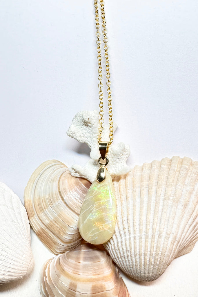 This opal pendant is very natural and gentle in colour and shape