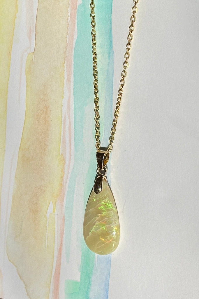 This opal pendant is very natural and gentle in colour and shape
