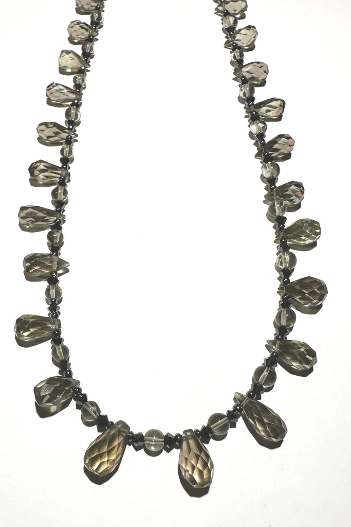 moky quartz necklace was made using sparkly faceted briolette cut stones along with swarovski crystals as a highlight.