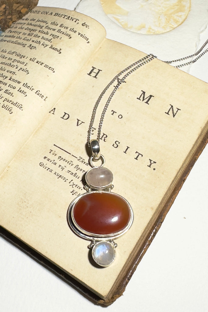A lovely trio, the strength of Carnelian stone with the softness of Rose Quartz and a Moonstone to glow.