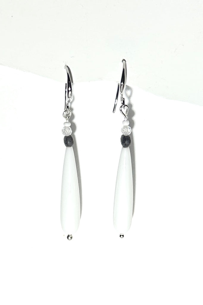 Gorgeous white drop earrings, a perfectly chic swing style to add a pop of style this summer