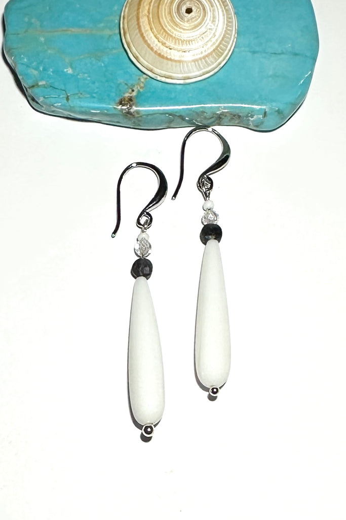 Gorgeous white drop earrings, a perfectly chic swing style to add a pop of style this summer