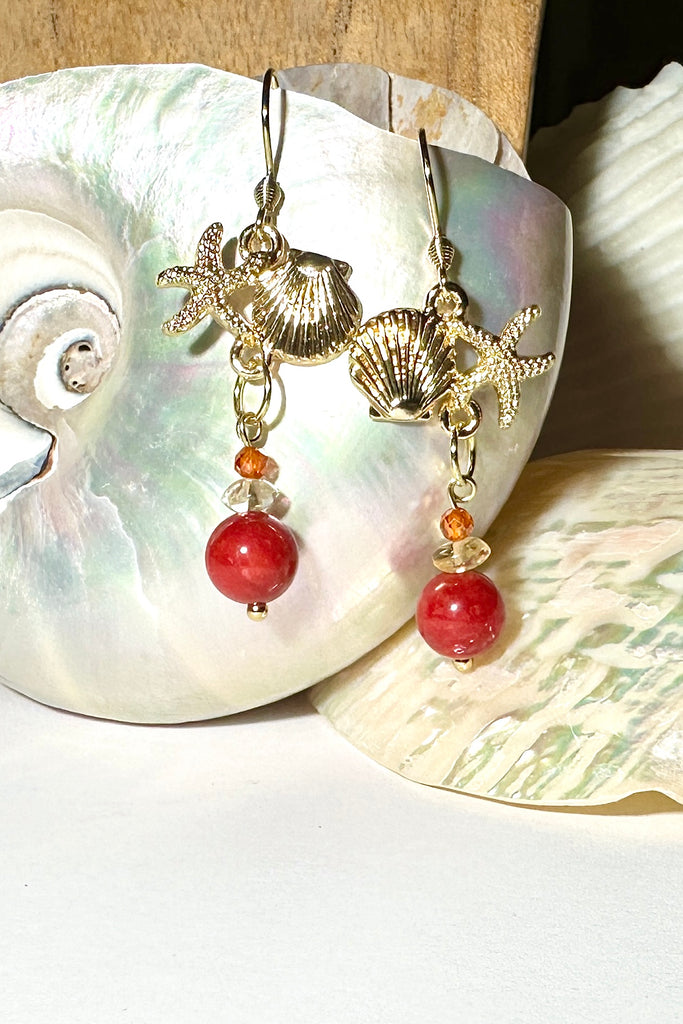 Drop earrings featuring bright red coloured bamboo coral bead, a shell and starfish highlight, a perfect&nbsp; swing style to add a pop of summer colour.

Red coloured bamboo coral and Citrine beads with brass shell and starfish.