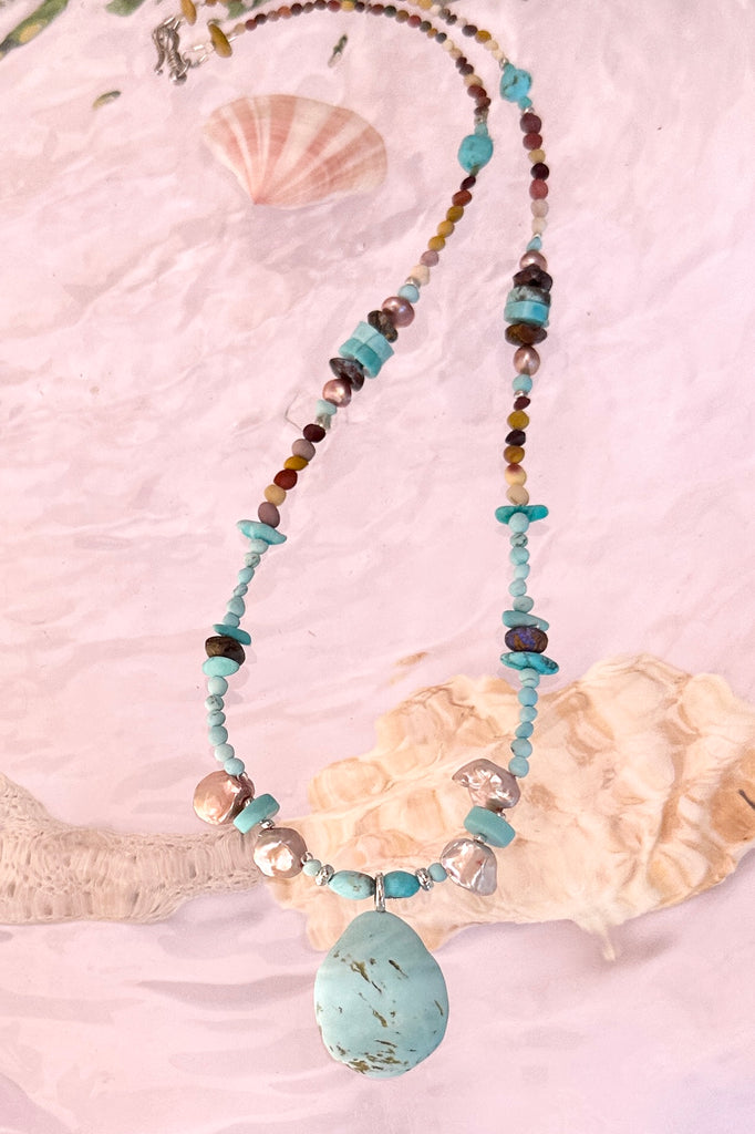 necklace perfect for summer.

Natural Turquoise with rock inclusions, Australian Mookaite beads, Australian Boulder Opal beads, baroque Pearls Natural Kingman Turquoise beads and round Howlite beads.