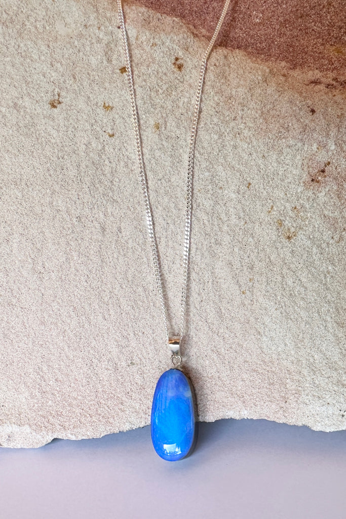 A beautiful opal pendant as blue as the sky on a summers day.&nbsp;

16.34ct Solid Australian boulder Opal, cobalt blue. Responsible sourcing.