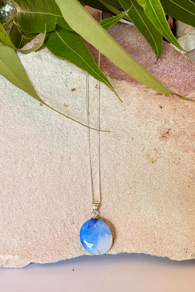 this Australian Opal pendant has shades of blue to silvery grey.

10.62ct Solid Australian boulder Opal.