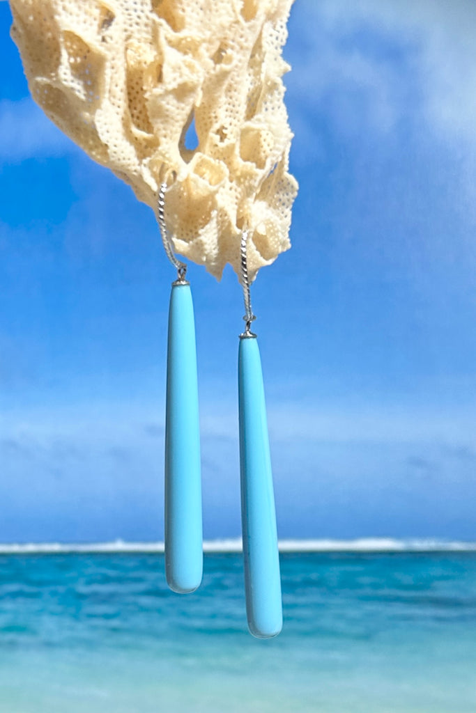 Elegant dangle earrings in turquoise colour.

7cm long from top of hook.