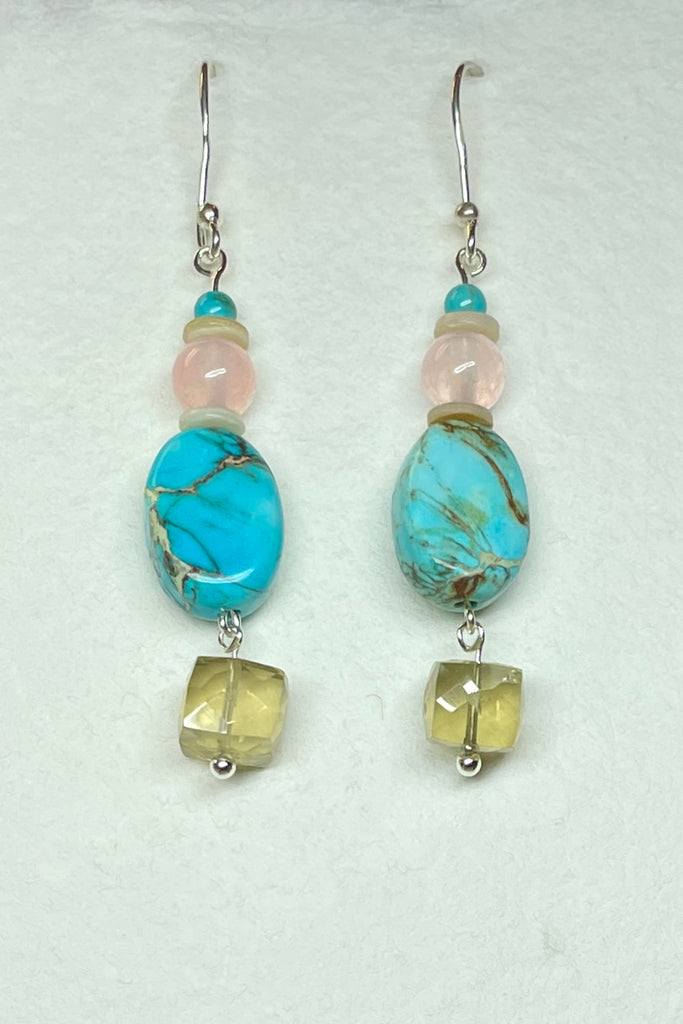 Drop style earrings statement earrings. 925 silver hook earrings. Stones are Coloured Agate, Carnelian and seashell.