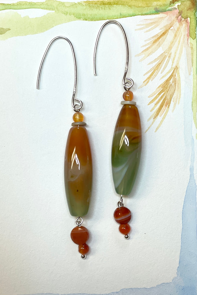 Drop style earrings statement earrings. 925 silver hook earrings. Stones are Coloured Agate, Carnelian and seashell.