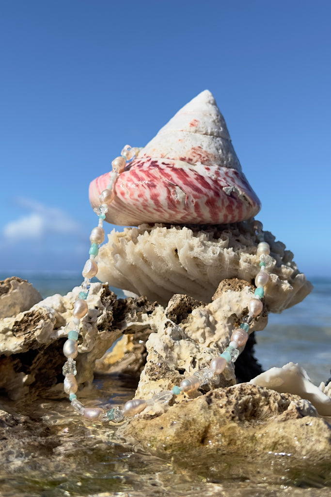 Tiny aqua drops on a tropical island lagoon, luminescent creamy white pearls with wave drops of palest blue Aquamarine and Amazonite beads, feel the calm of the islands.