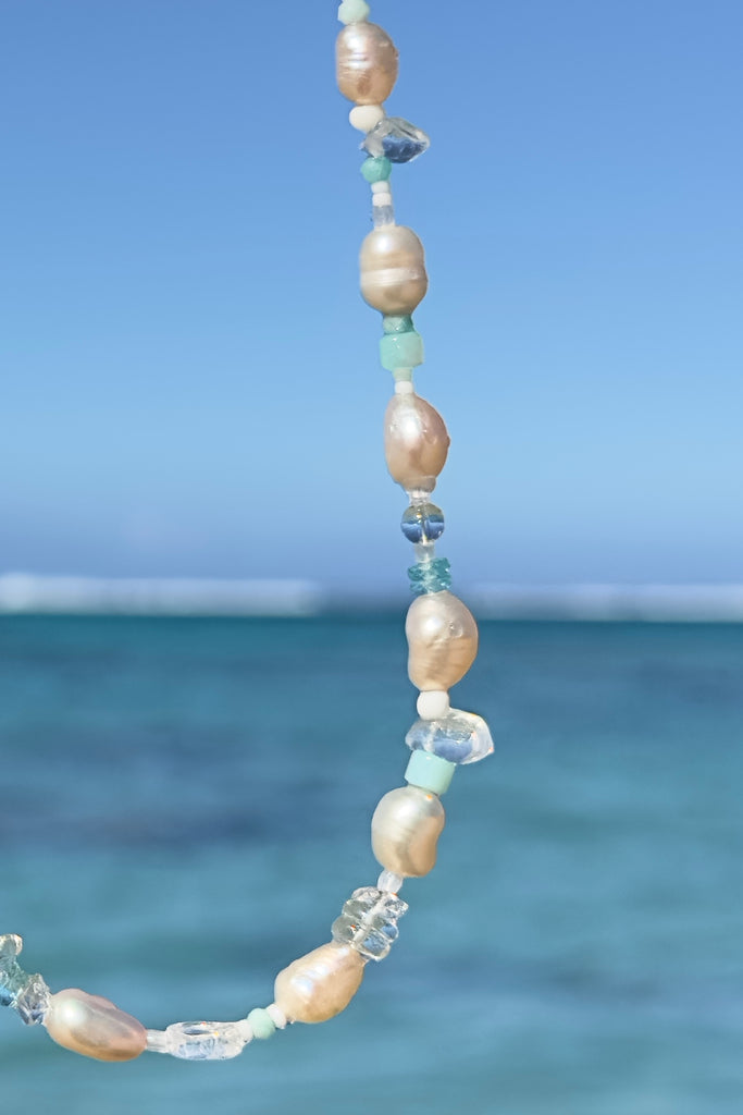 Tiny aqua drops on a tropical island lagoon, luminescent creamy white pearls with wave drops of palest blue Aquamarine and Amazonite beads, feel the calm of the islands.