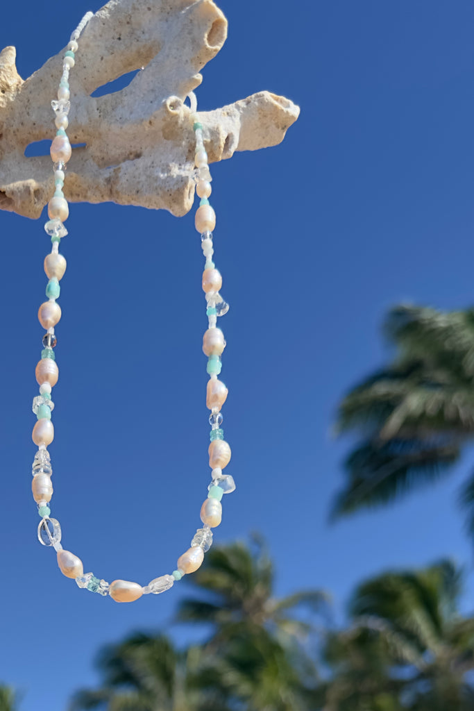 Tiny aqua drops on a tropical island lagoon, luminescent creamy white pearls with wave drops of palest blue Aquamarine and Amazonite beads, feel the calm of the islands.
