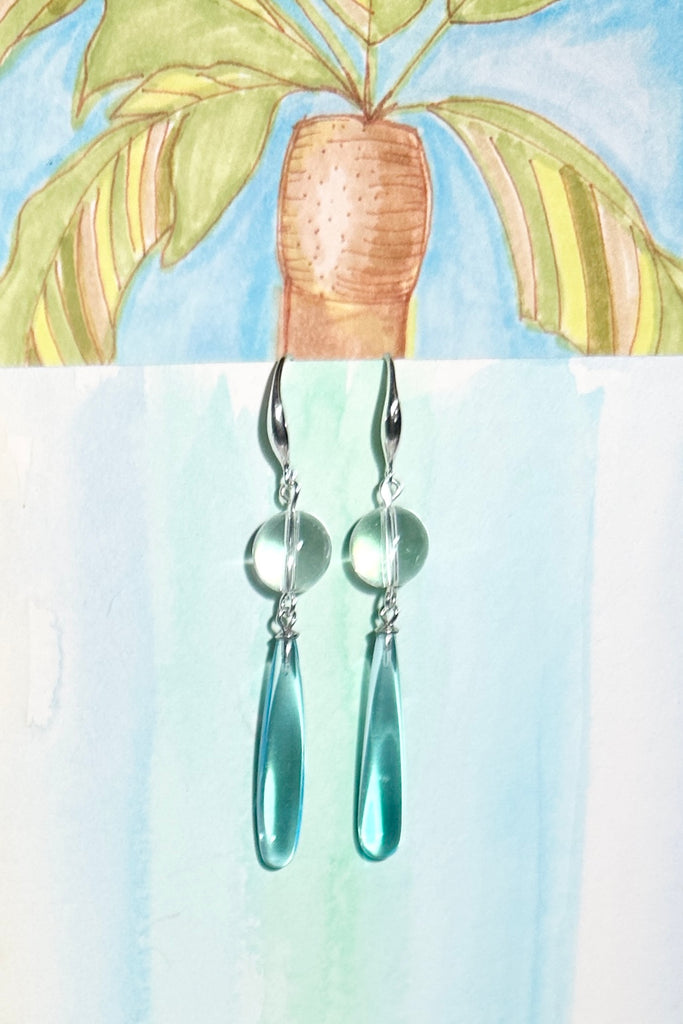 Drop earrings as pretty as the wave spray, a perfect clear sky blue. A bead of perfect Rock Crystal at the top.

Clear sky blue with a Rock Crystal bead.