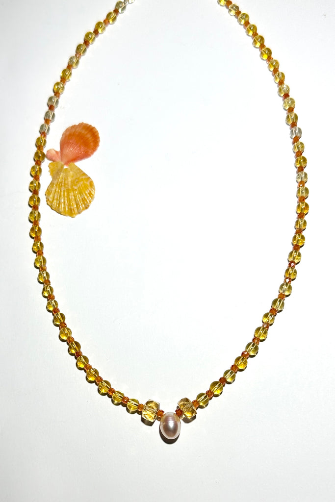 This citrine necklace shimmers, shines &amp; sparkles, like a shaft of warm summer sun.

4mm round Citrine beads, heishi cut Citrine beads, micro cut and faceted Zircon, a pale peach fresh water pearl