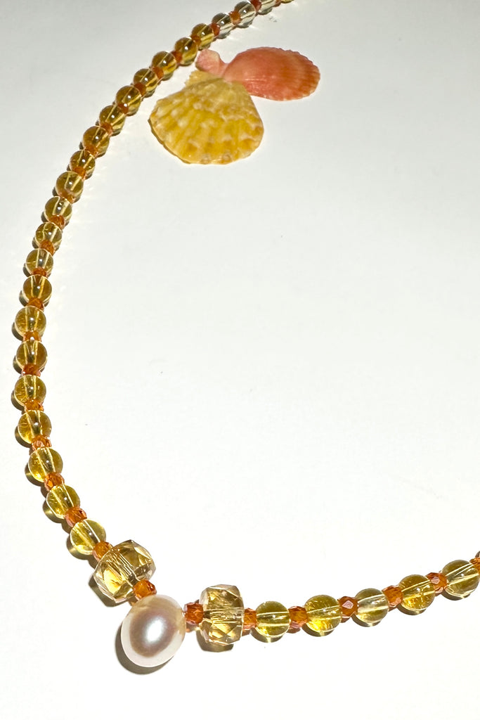 This citrine necklace shimmers, shines &amp; sparkles, like a shaft of warm summer sun.

4mm round Citrine beads, heishi cut Citrine beads, micro cut and faceted Zircon, a pale peach fresh water pearl