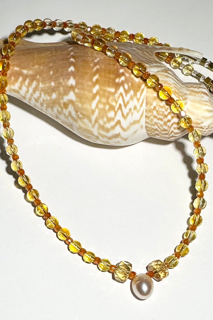 This citrine necklace shimmers, shines &amp; sparkles, like a shaft of warm summer sun.

4mm round Citrine beads, heishi cut Citrine beads, micro cut and faceted Zircon, a pale peach fresh water pearl