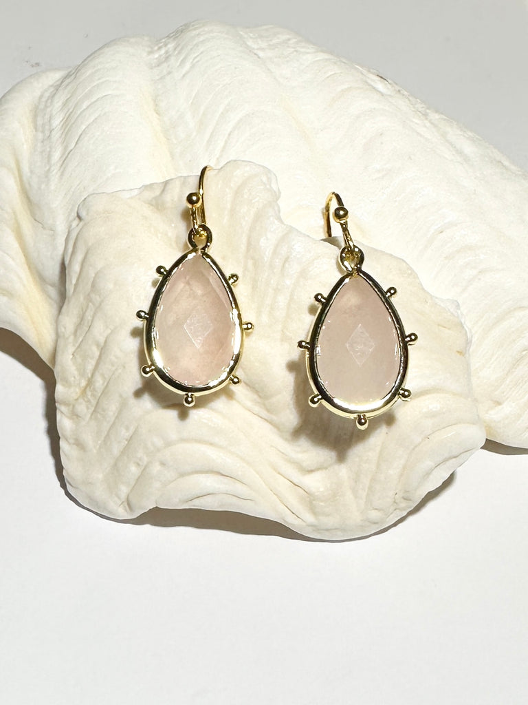 Drop style earrings.
Bezel set faceted pale Rose Quartz.