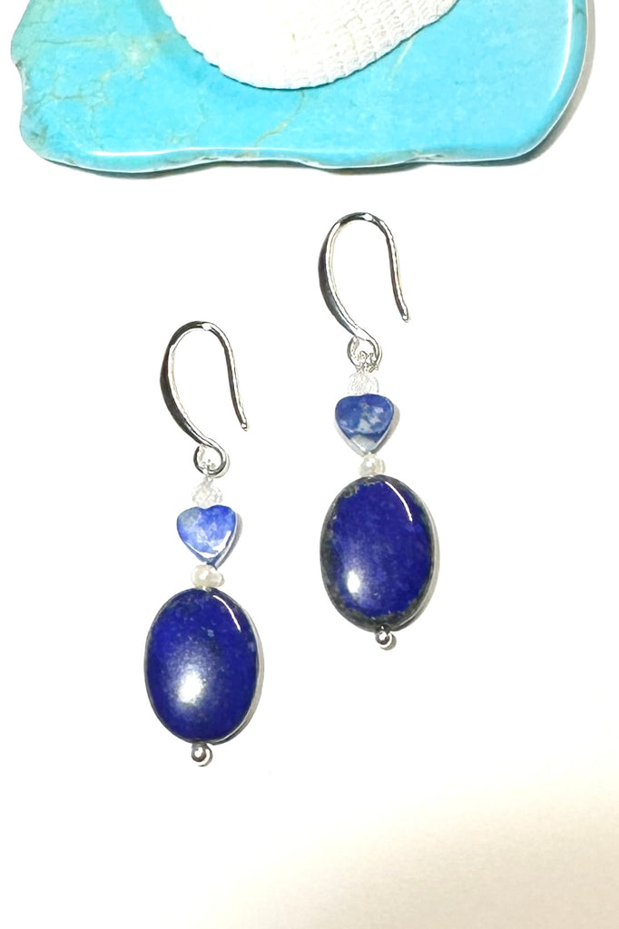 Very chic and very modern, Lapis Lazuli earrings in oval rounded beads with a little heart bead and a tiny pearl. they have a casual and stylish vibe.
