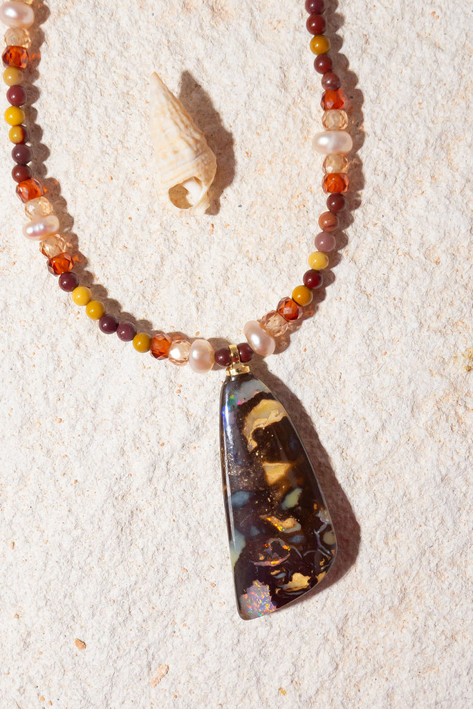 Inspired by the colours of the great Australian Outback this radiant piece features both an Australian Opal and Australian Mookaite.