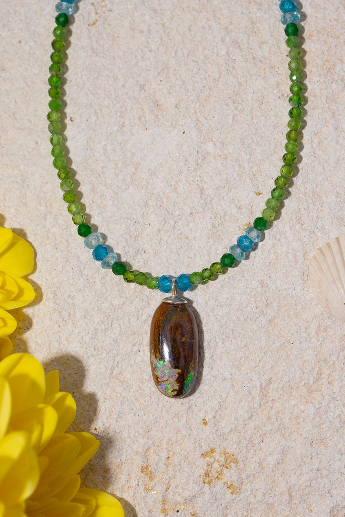 Gorgeous glowing green gemstones are the perfect match for this delicate Australian Boulder Opal pendant.