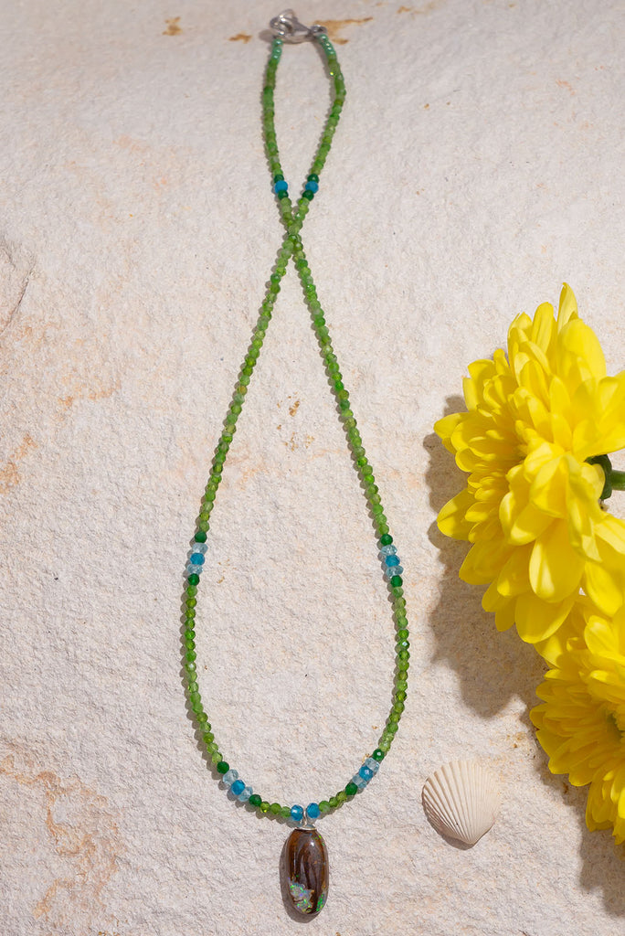 Gorgeous glowing green gemstones are the perfect match for this delicate Australian Boulder Opal pendant.