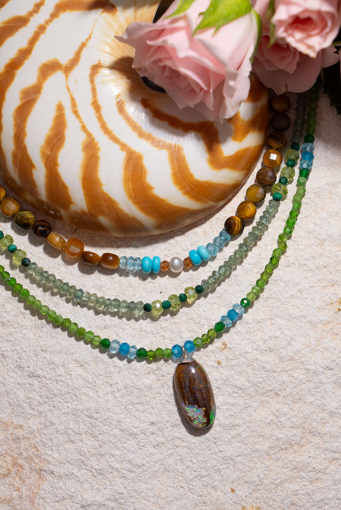 Gorgeous glowing green gemstones are the perfect match for this delicate Australian Boulder Opal pendant.