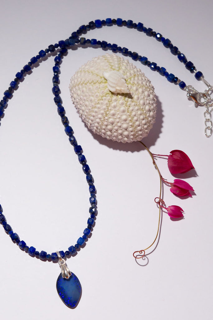Deep Ocean blue, this Opal and Lapis Lazuli necklace brings the depth of the seas and the mystery of Neptune.