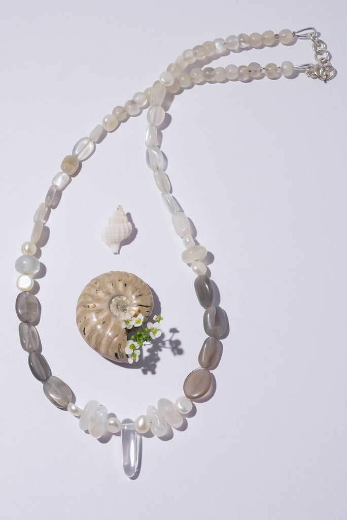 Like the soft shimmering swirls of an early misty morning our ethereal Necklace Cay Crystal Moon feels just a little bit magical.