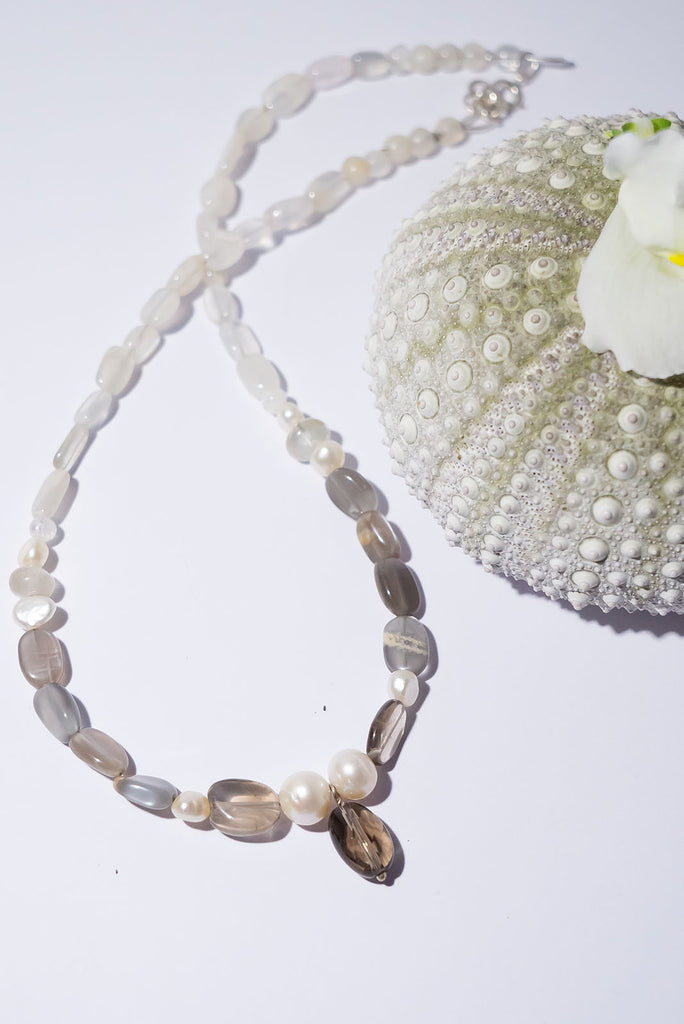 A beautiful mix of shimmer and sparkle with misty moonstone and faceted smoky quartz this is a beautiful and enchanting necklace.
