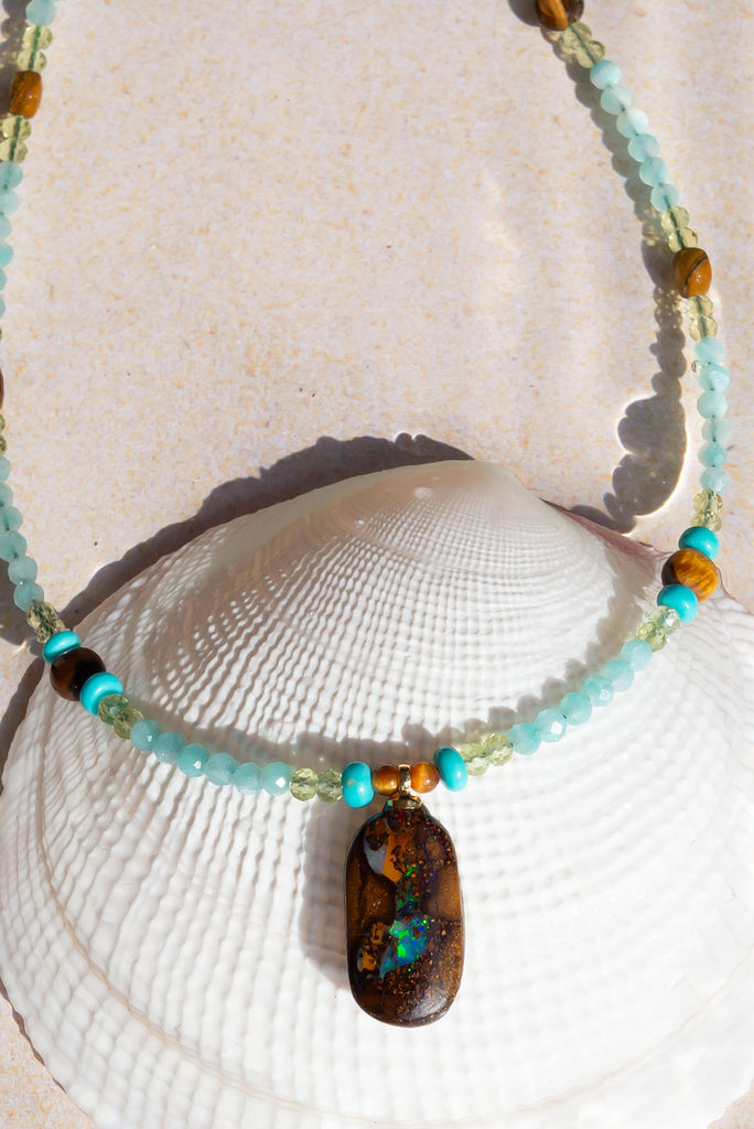 Reminiscent of cool ocean waves crash against the waterworn walls of an ancient sea grotto.