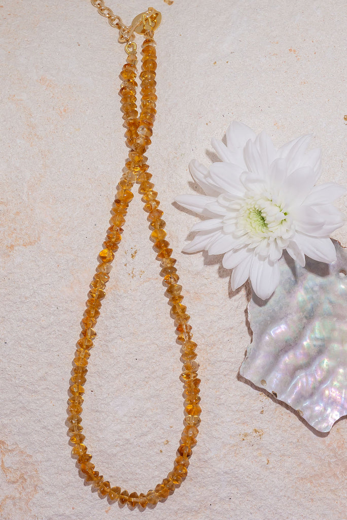 Like glowing droplets of sunshine this radiant necklace is the perfect sparkling addition to any outfit.