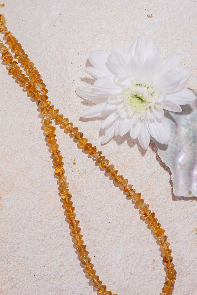 Like glowing droplets of sunshine this radiant necklace is the perfect sparkling addition to any outfit.