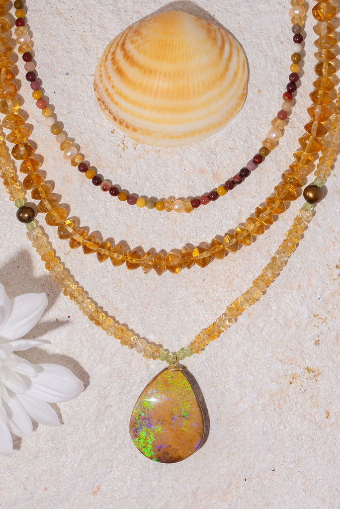 Like glowing droplets of sunshine this radiant necklace is the perfect sparkling addition to any outfit.