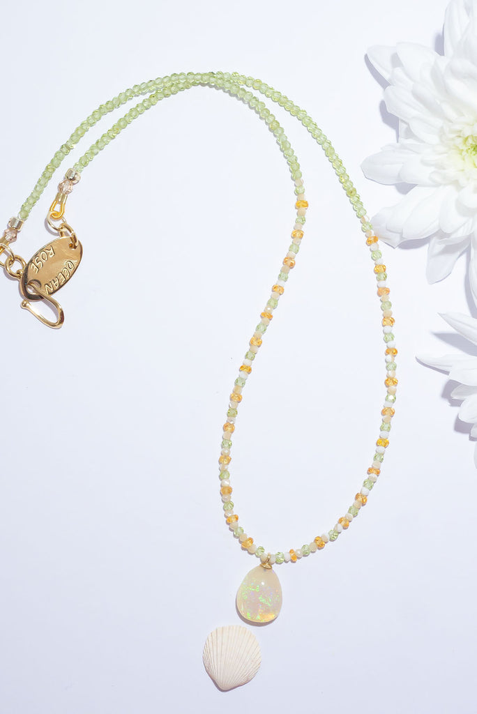 Glittering citrus shaded gemstones and a sparkling Australian opal make for a beautiful summery style.