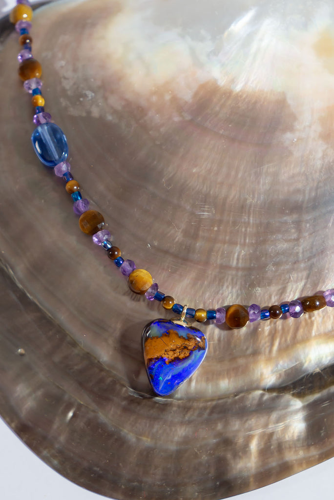 Inspired by the colours of a midnight sky over the Australian desert this gorgeous necklace is sure to enchant you.