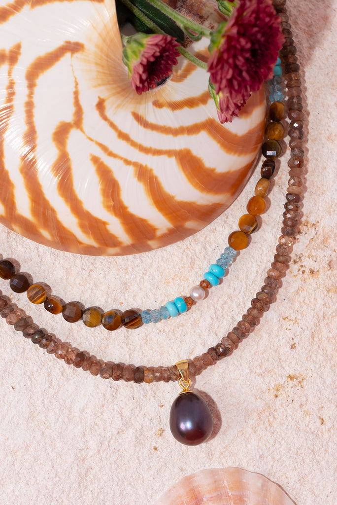 With is gorgeous rich espresso tones this gorgeous pearl & andalusite necklace is a wonderful neutral piece.