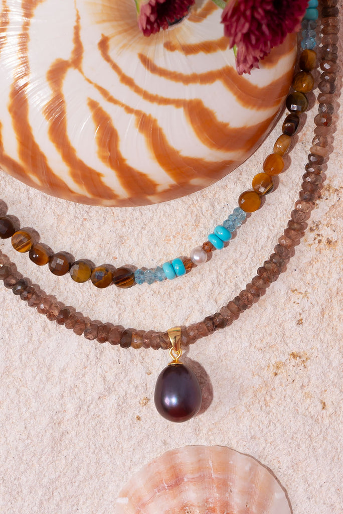 With is gorgeous rich espresso tones this gorgeous pearl & andalusite necklace is a wonderful neutral piece.