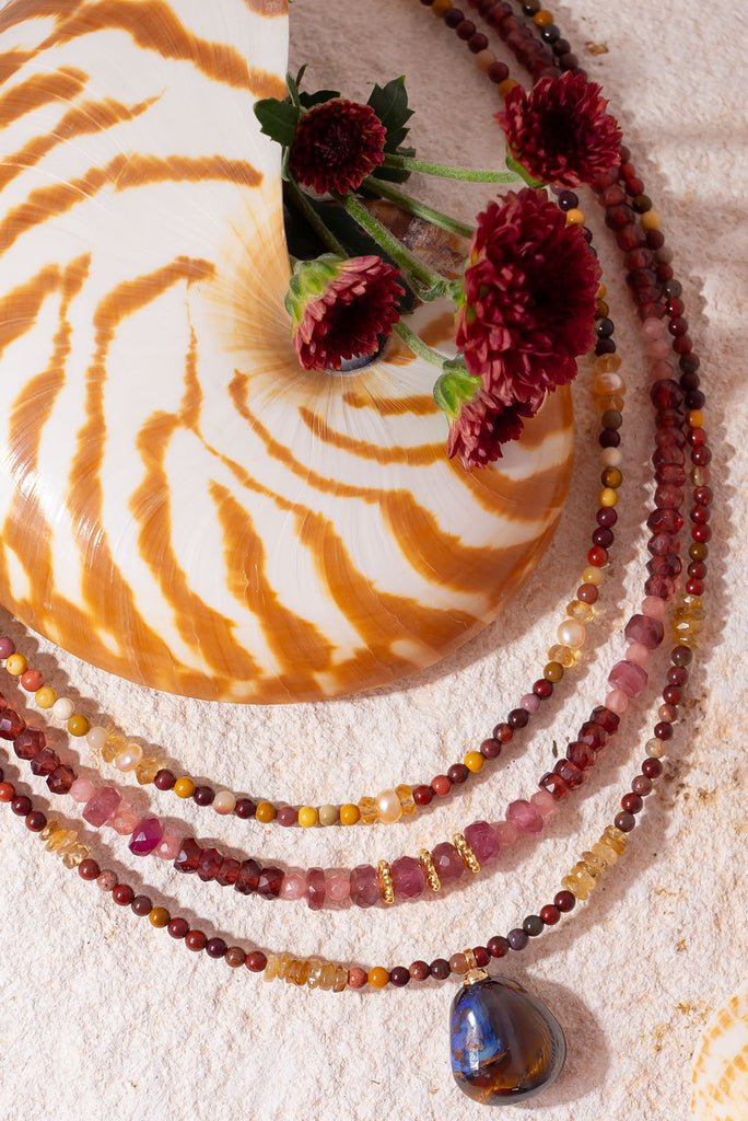 For the love of a rose. This enchanting rose hued gemstone necklace is an ode to romance.