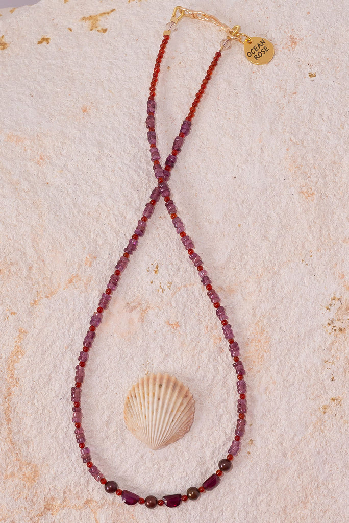 A beautiful concoction of raspberry, mulberry and strawberry hues this delicate gemstone necklace is simply delightful.