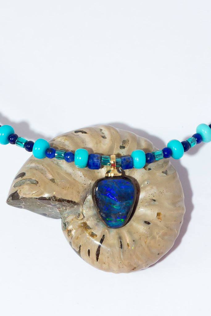 With the colours of a tropical atoll under a midnight sky this magical necklace will enchant you.