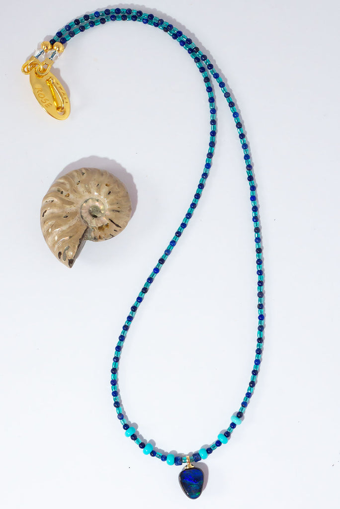 With the colours of a tropical atoll under a midnight sky this magical necklace will enchant you.