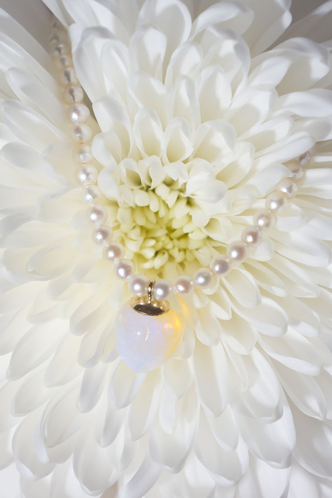 This gorgeous dewdrop of solid Australian jelly opal has a enchanting ethereal glow.