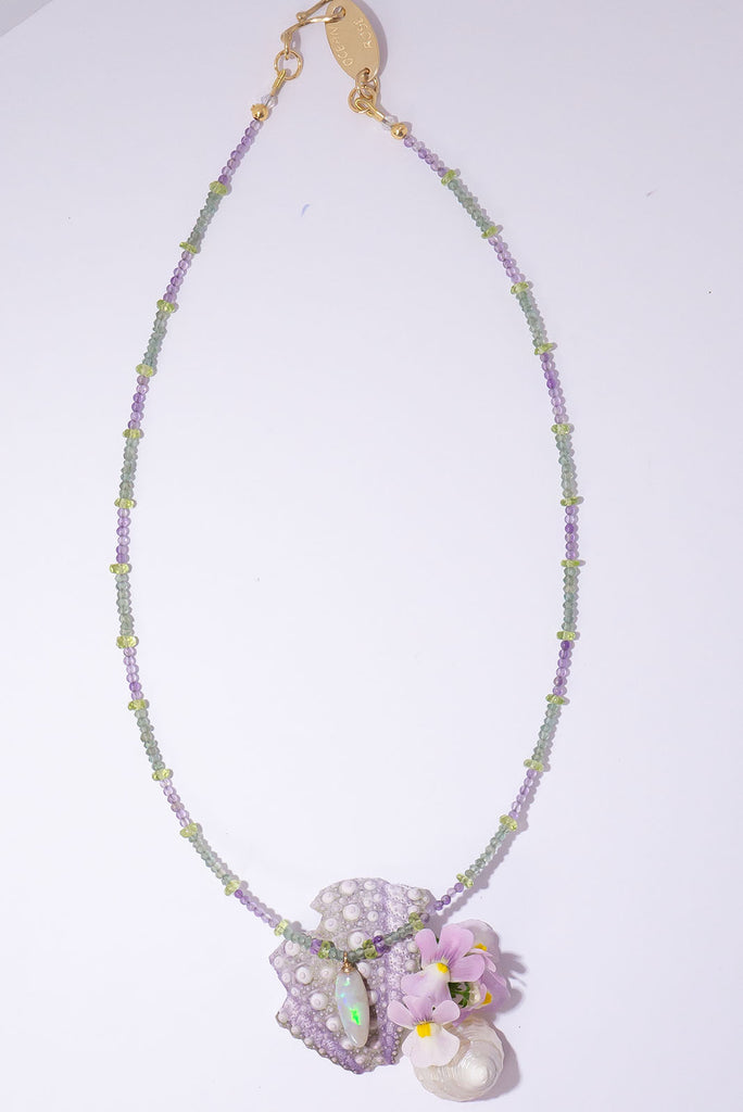With soft shades of leaf green and periwinkle this delicate gemstone necklace is reminiscent of a beautiful blooming Hydrangea.