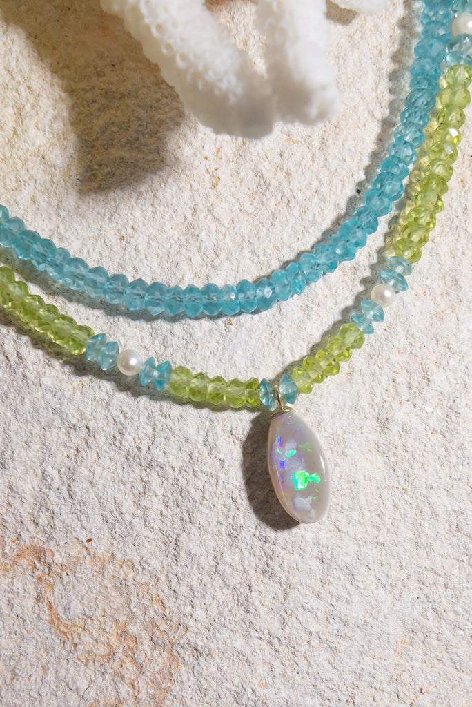 Like the cool clear water of the Pacific Ocean lapping at the white sands beach this gorgeous piece sparkles and shimmers in the sunshine.