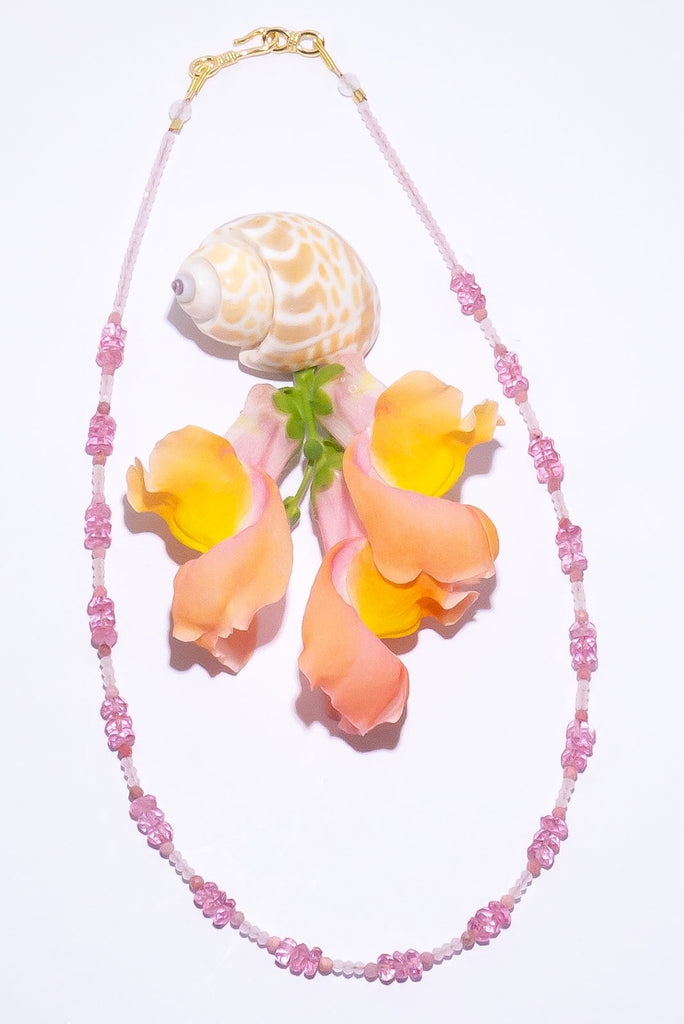 Sweet like candy floss! This delicate necklace packs a pretty pink punch of colour.
