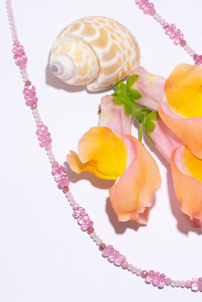 Sweet like candy floss! This delicate necklace packs a pretty pink punch of colour.