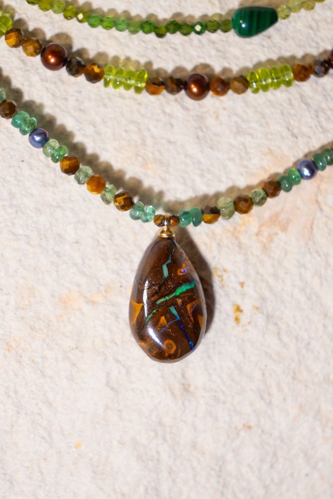 A beautiful blend of earthy brown hues, shimmering pearls and gorgeous greens. This is enchanting necklace is inspired by the colours of a tropical Queensland rainforest.