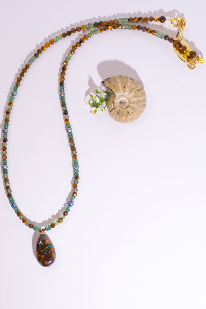 A beautiful blend of earthy brown hues, shimmering pearls and gorgeous greens. This is enchanting necklace is inspired by the colours of a tropical Queensland rainforest.