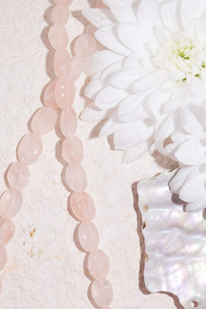 A delicate shade of pastel rose pink this piece would make a romantic addition to any wardrobe.
